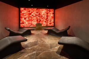 a waiting room with chairs and a large window at Grand Hotel View in Postira