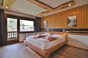 Katil atau katil-katil dalam bilik di Pension & Apartments Weissbriach