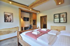 Katil atau katil-katil dalam bilik di Pension & Apartments Weissbriach