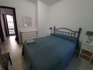 Villa Puerto Santa María房間的床