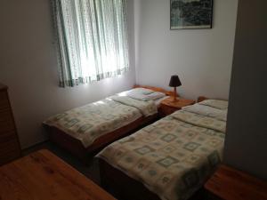Postel nebo postele na pokoji v ubytování PAN Dom Pracy Twórczej w Wierzbie