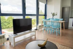 TV a/nebo společenská místnost v ubytování Mar de Sada