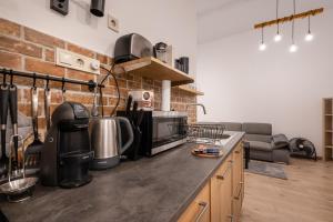 A kitchen or kitchenette at Peachy Homes Apartment