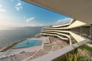 a view of the ocean from the balcony of a hotel at Grand Hotel View in Postira