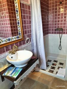 Kylpyhuone majoituspaikassa La Contrada