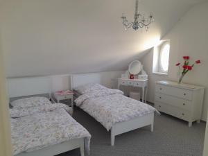 Ένα ή περισσότερα κρεβάτια σε δωμάτιο στο Pod skálou, Mánesova 646