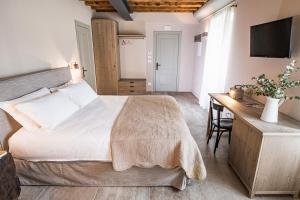 Postel nebo postele na pokoji v ubytování Borgo Gradis'ciutta