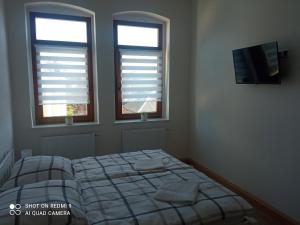 Postel nebo postele na pokoji v ubytování Pension Eberhart