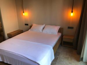 Postel nebo postele na pokoji v ubytování Life Butiq Otel