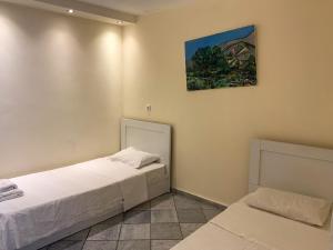 Postel nebo postele na pokoji v ubytování Sea View Studios & Apartments
