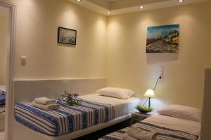 Postel nebo postele na pokoji v ubytování Sea View Studios & Apartments