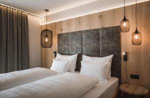 A bed or beds in a room at AhriaPura