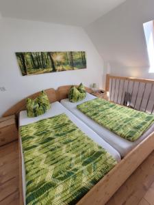 Postel nebo postele na pokoji v ubytování Rennsteigscheune