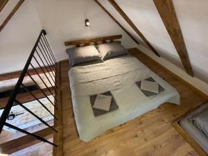 Voodi või voodid majutusasutuse Apartmány TIME toas