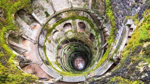 an aerial view of a tunnel in a rock wall at Casa Mateus - Colares, Parque Natural Sintra Cascais in Sintra
