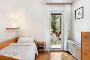 Katil atau katil-katil dalam bilik di Primula Cottage, a step away from Kranjska Gora