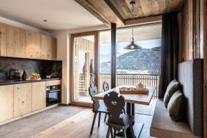 Kuchyň nebo kuchyňský kout v ubytování Oberfallerhof Apartment Aui