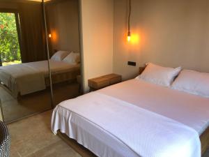 Postel nebo postele na pokoji v ubytování Life Butiq Otel