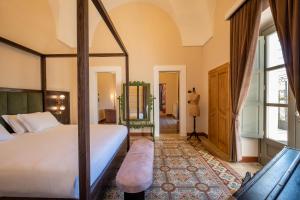 Postel nebo postele na pokoji v ubytování Nohasi Palace Lifestyle Hotel & SPA + 37 fotografií