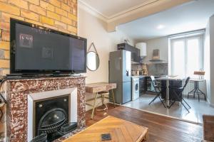Η κουζίνα ή μικρή κουζίνα στο Appartement Milhan avec climatisation centre ville +20 φωτογραφίες