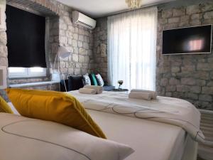 Postel nebo postele na pokoji v ubytování Guest House Klaudija