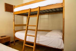 Letto o letti in una camera di Residence Nube D'Argento