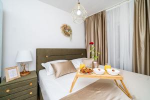 Voodi või voodid majutusasutuse Apartment House of Artichoke with amazing sea view, Dubrovnik toas