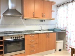 Kuchnia lub aneks kuchenny w obiekcie Magnífico Ático Dúplex con barbacoa
