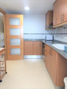 Kuchnia lub aneks kuchenny w obiekcie Magnífico Ático Dúplex con barbacoa