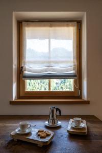 Kemudahan buat kopi dan teh di Chalet Ines