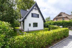 Ein Garten an der Unterkunft Einzelhaus Boathouse Boathouse