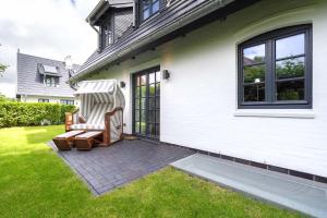 Ein Garten an der Unterkunft Einzelhaus Boathouse Boathouse