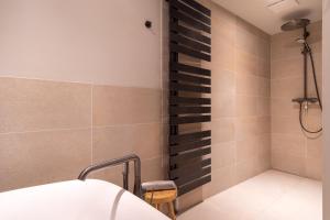 Ein Badezimmer in der Unterkunft Einzelhaus Boathouse Boathouse