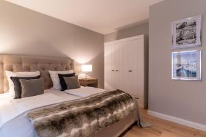 Ein Bett oder Betten in einem Zimmer der Unterkunft Einzelhaus Boathouse Boathouse