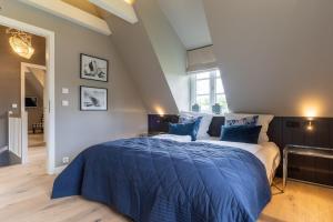 Ein Bett oder Betten in einem Zimmer der Unterkunft Einzelhaus Boathouse Boathouse