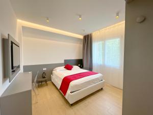 מיטה או מיטות בחדר ב-Arcioun Suite