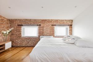 Posteľ alebo postele v izbe v ubytovaní Le Cosy Spa & Office au cœur de Toulouse
