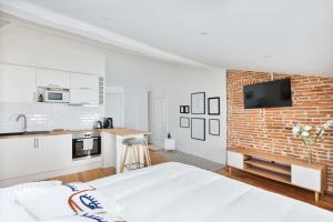 Kuchyňa alebo kuchynka v ubytovaní Le Cosy Spa & Office au cœur de Toulouse