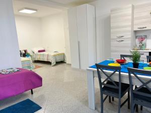 Posteľ alebo postele v izbe v ubytovaní Bnbook Olona-Fiera Milano