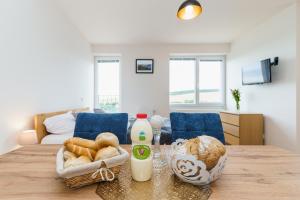 Televízia a/alebo spoločenská miestnosť v ubytovaní Horský apartmán Temari 1 Klínovec