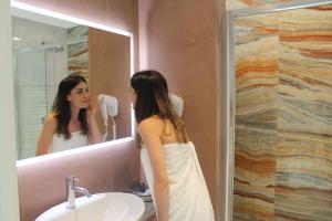 Kúpeľňa v ubytovaní B&B Primrose Residence Hotel
