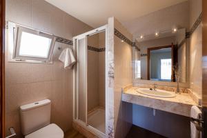 Kúpeľňa v ubytovaní IROCO HOSTAL