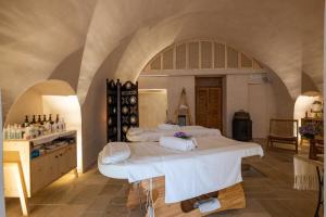 Postel nebo postele na pokoji v ubytování Nohasi Palace Lifestyle Hotel & SPA
