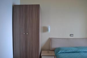 Кровать или кровати в номере Hotel Costa Azzurra