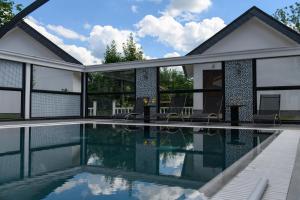 Bazén v ubytování Angelo Spa Resort nebo v jeho okolí