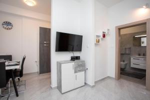 Kuchyň nebo kuchyňský kout v ubytování Apartmani Marica