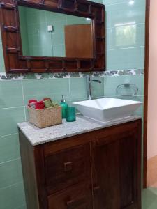 Ванна кімната в Glykoharama Cottage