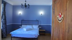 Postel nebo postele na pokoji v ubytování Nur Guest House