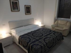 A bed or beds in a room at CASA DEGLI ANTO'