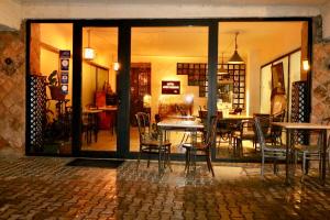 a dining room with a table and chairs at Artists Residence in Tbilisi in Tbilisi City